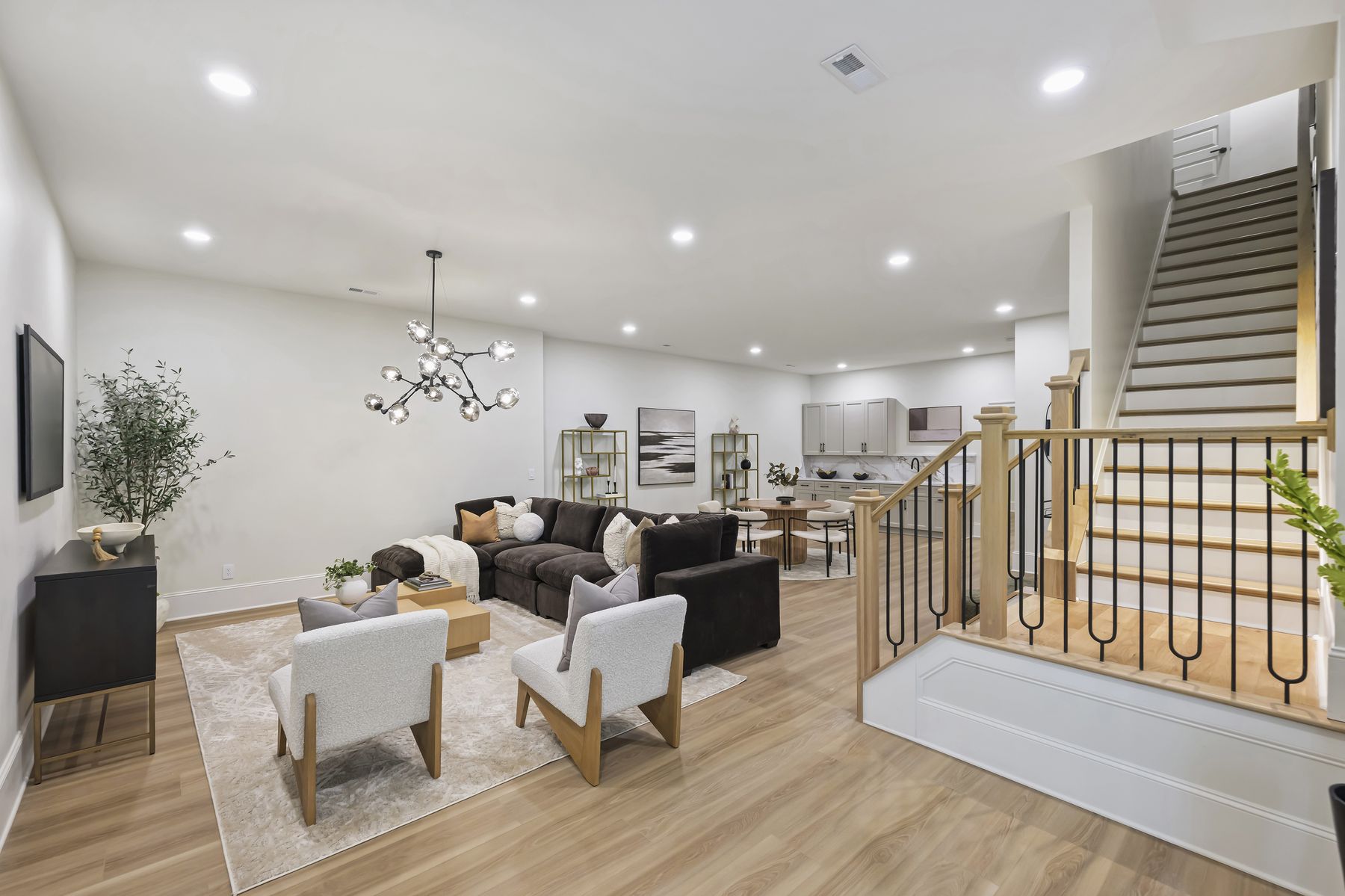 Finished 1,800-square-foot lower level with a wet bar and full-height windows